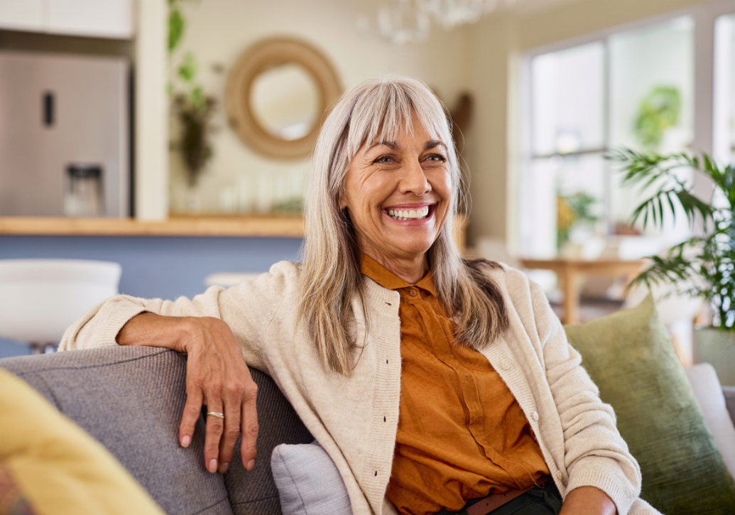 Smiling female patient with Dental Implants